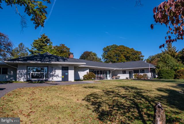 19 Valley Road Lewistown, PA 17044 - Photo 2 of 37 a front view of a house with a yard tree and outdoor seating