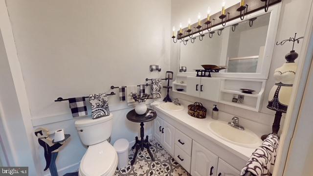 19 Valley Road Lewistown, PA 17044 - Photo 30 of 37 a bathroom with a sink a toilet and shower curtain
