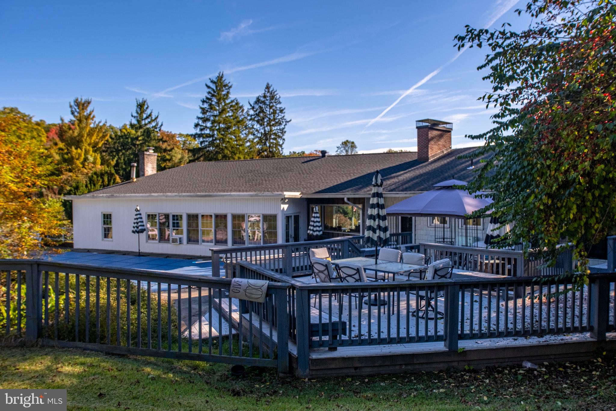 19 Valley Road Lewistown, PA 17044 - Photo 32 of 37 a front view of a house with garden and deck