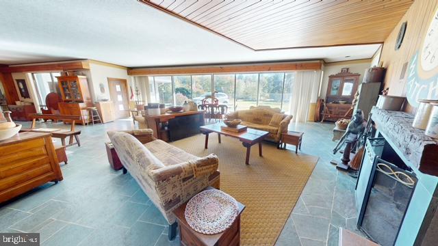 19 Valley Road Lewistown, PA 17044 - Photo 4 of 37 a living room with fireplace furniture and a large window
