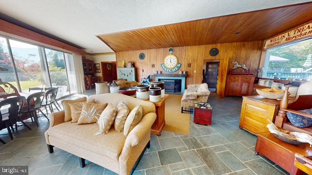 19 Valley Road Lewistown, PA 17044 - Photo 6 of 37 a living room with furniture and a floor to ceiling window