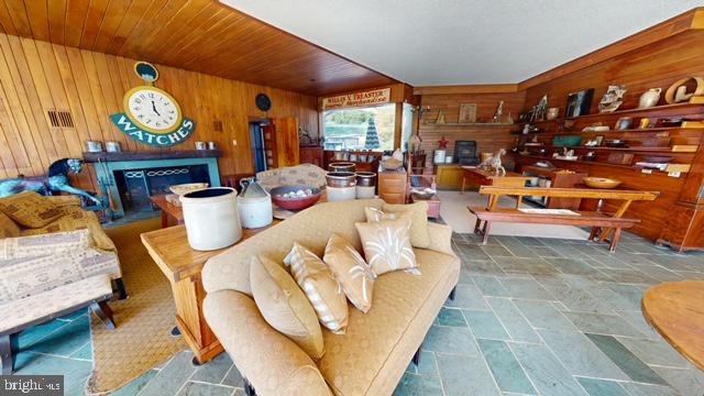 19 Valley Road Lewistown, PA 17044 - Photo 7 of 37 a living room with fireplace furniture and a large window