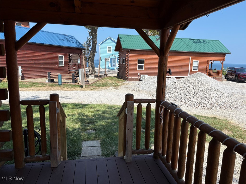 5919 Lake Road West, Unit 13 Ashtabula, OH 44004 - Photo 26 of 35 Wooden deck featuring view toward Lake