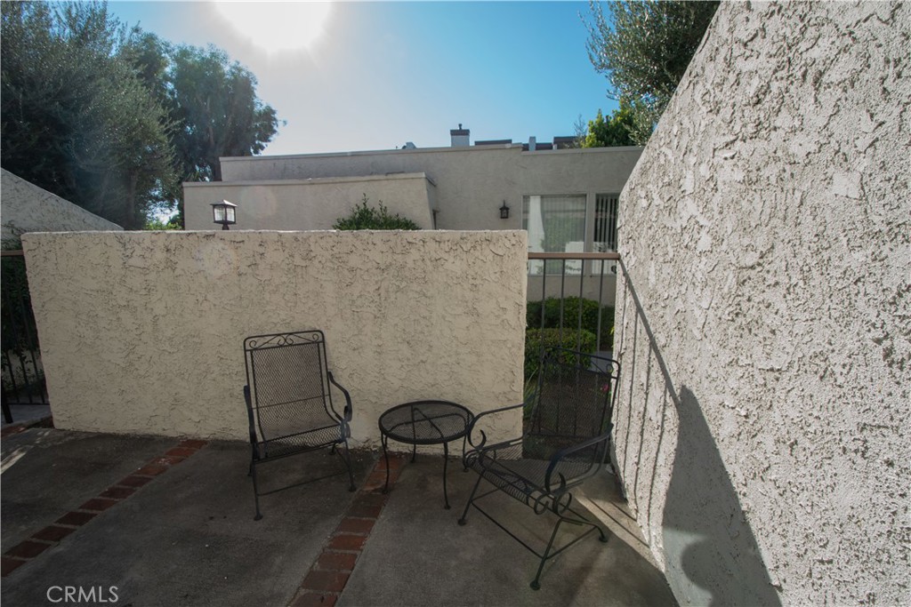18340 Collins Street, Unit E Tarzana, CA 91356 - Photo 3 of 29 a view of outdoor seating area