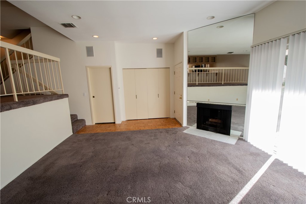 18340 Collins Street, Unit E Tarzana, CA 91356 - Photo 5 of 29 a view of empty room with kitchen