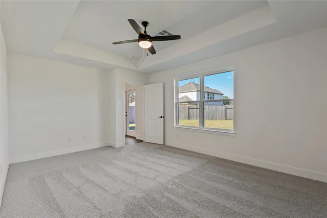a bathroom with a granite countertop sink double and mirror