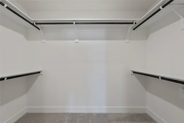 a bathroom with a granite countertop sink toilet and bathtub