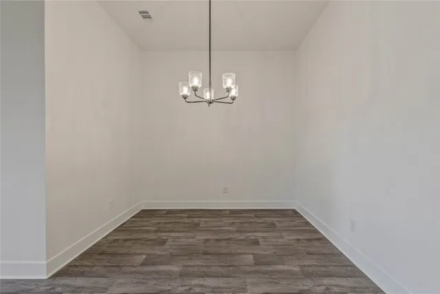 a view of kitchen with sink microwave and stove
