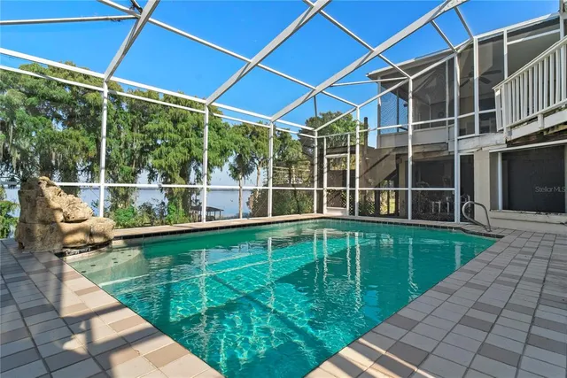 a view of a house with a swimming pool