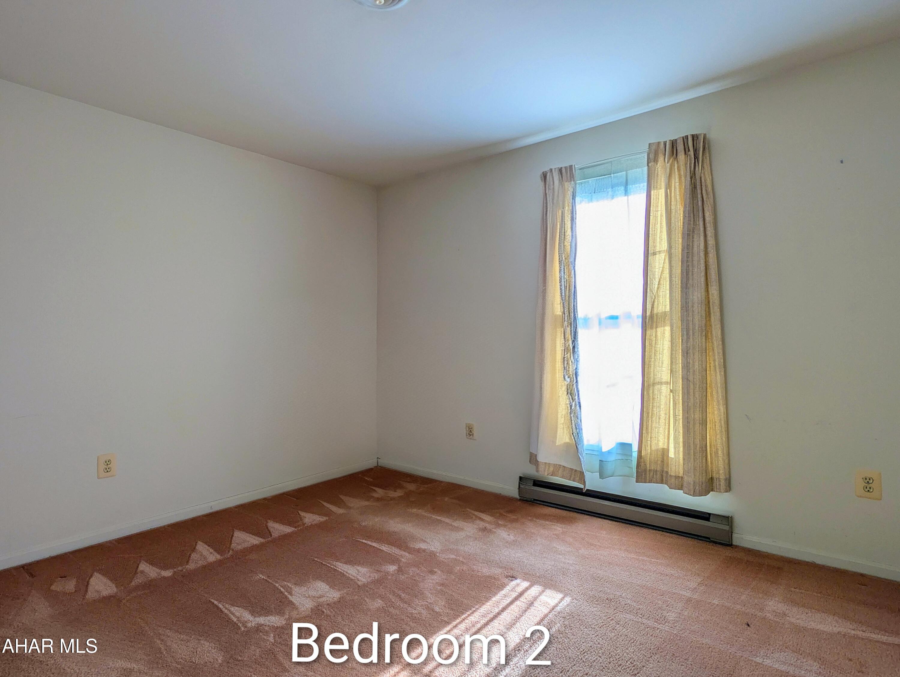 147 Pine Street Hyndman, PA 15545 - Photo 22 of 44 a view of an empty room and window