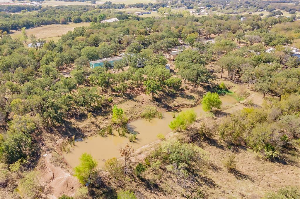419 Wood River Road Millsap, TX 76066 - Photo 22 of 36 a view of a lake with a mountain
