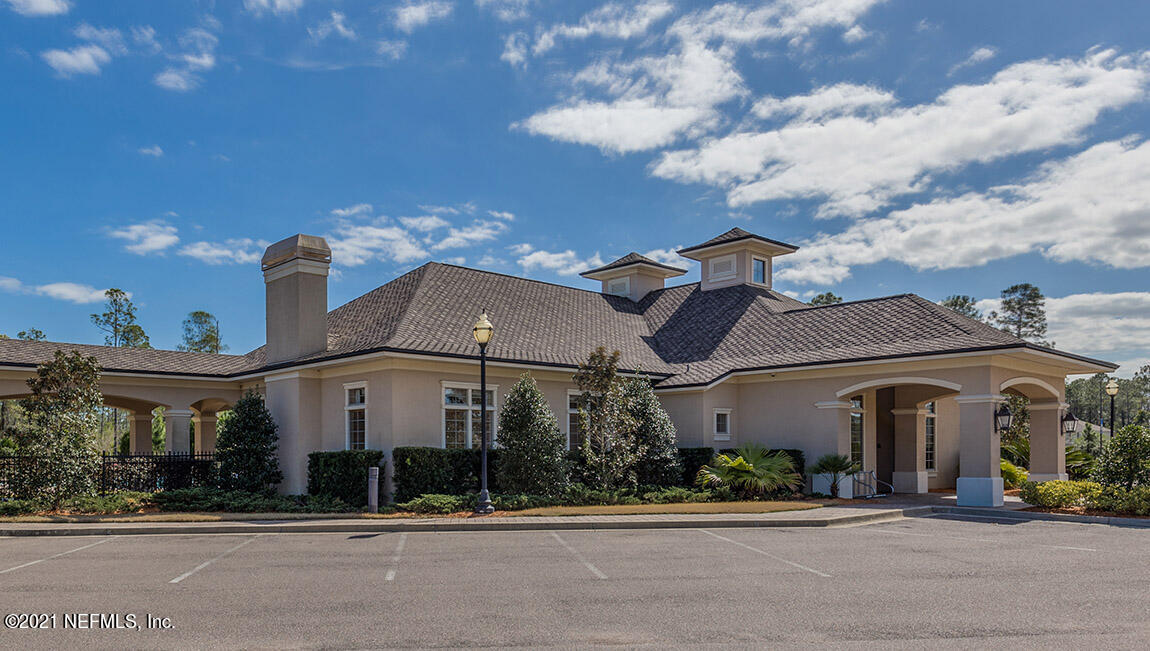 65736 Edgewater Drive Yulee, FL 32097 - Photo 18 of 44 a front view of a building with street