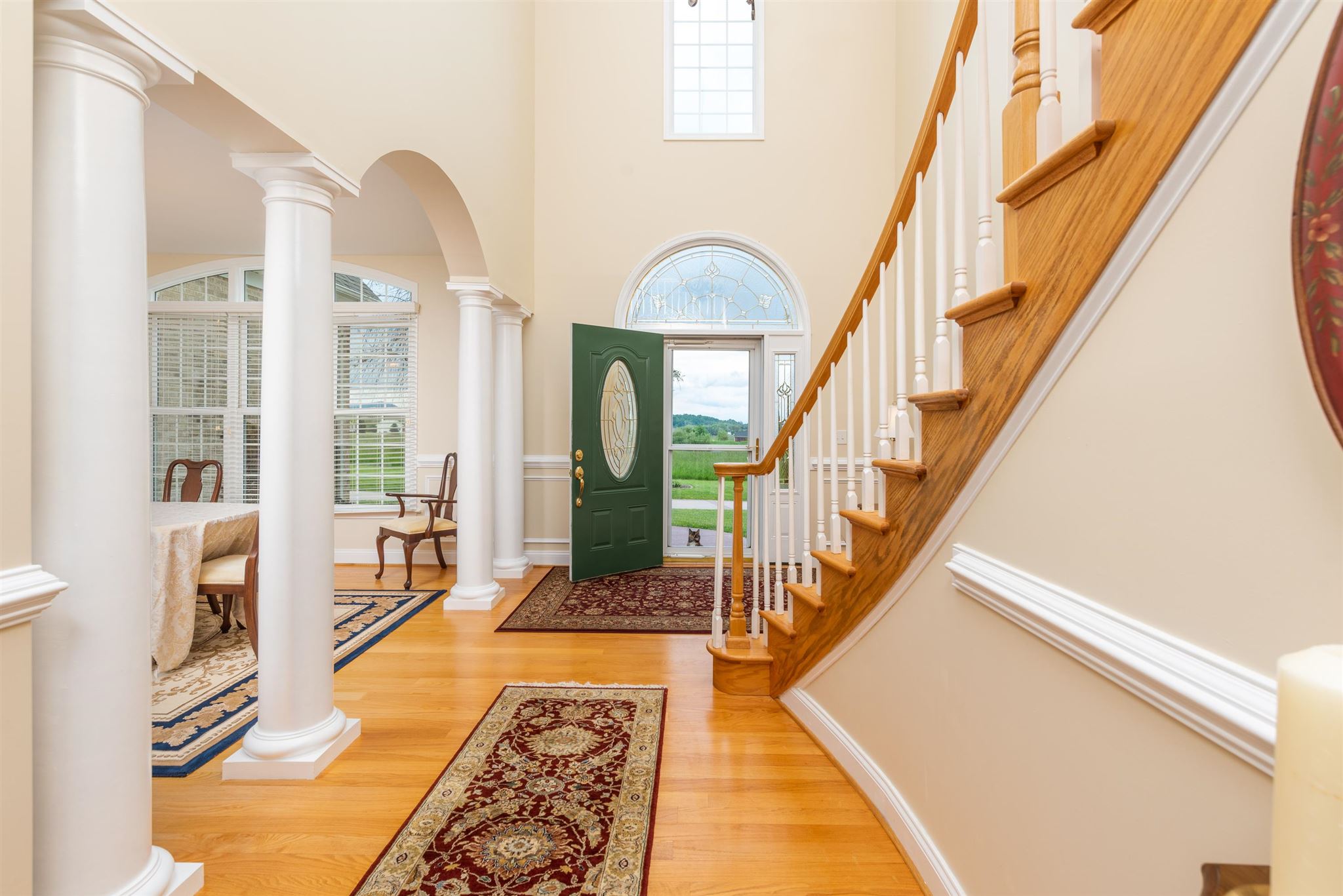 60 Koogler Trail Raphine, VA 24472 - Photo 7 of 75 a view of an entryway with wooden floor and a rug