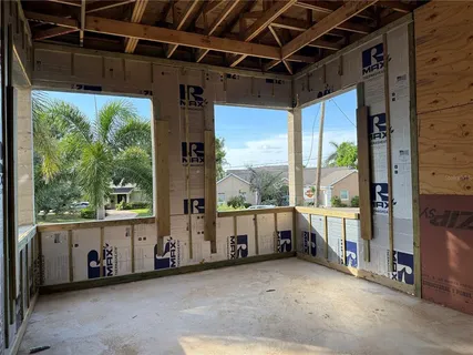a view of an empty room with a balcony
