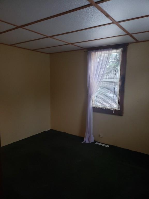 912 Walnut Plain Road Rochester, MA 02770 - Photo 12 of 20 a view of a small space with wooden floor and a window