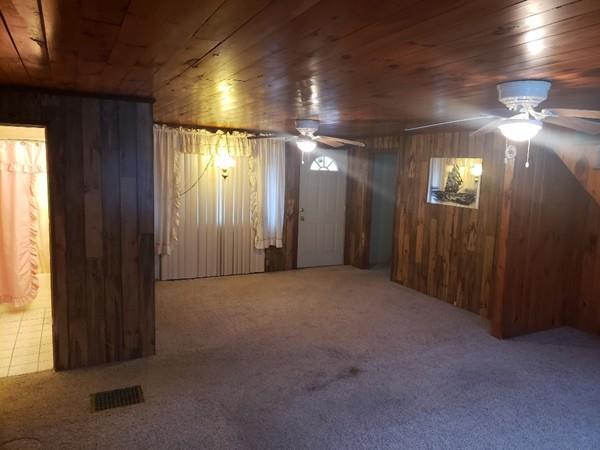 912 Walnut Plain Road Rochester, MA 02770 - Photo 9 of 20 a view of an empty room with a window