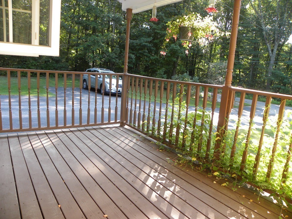 21 Bay Path Road Charlton, MA 01507 - Photo 16 of 30 a view of a balcony with wooden floor