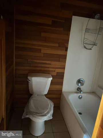 a bathroom with a sink and washing machine
