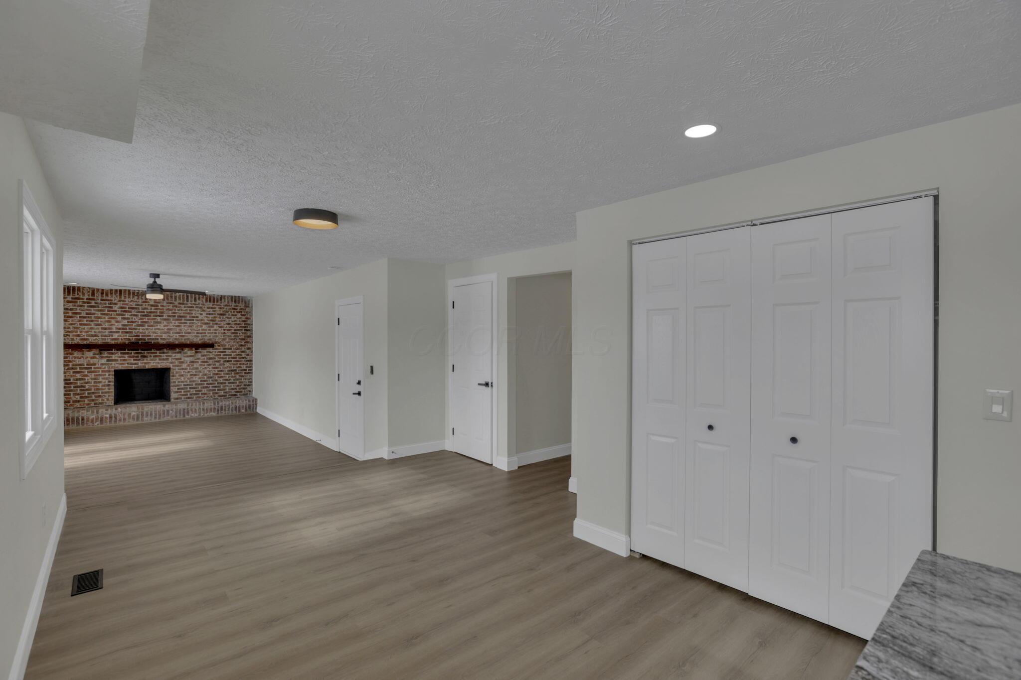 5273 Hayes Road Groveport, OH 43125 - Photo 29 of 89 Wall to wall brick fireplace adorns the family room