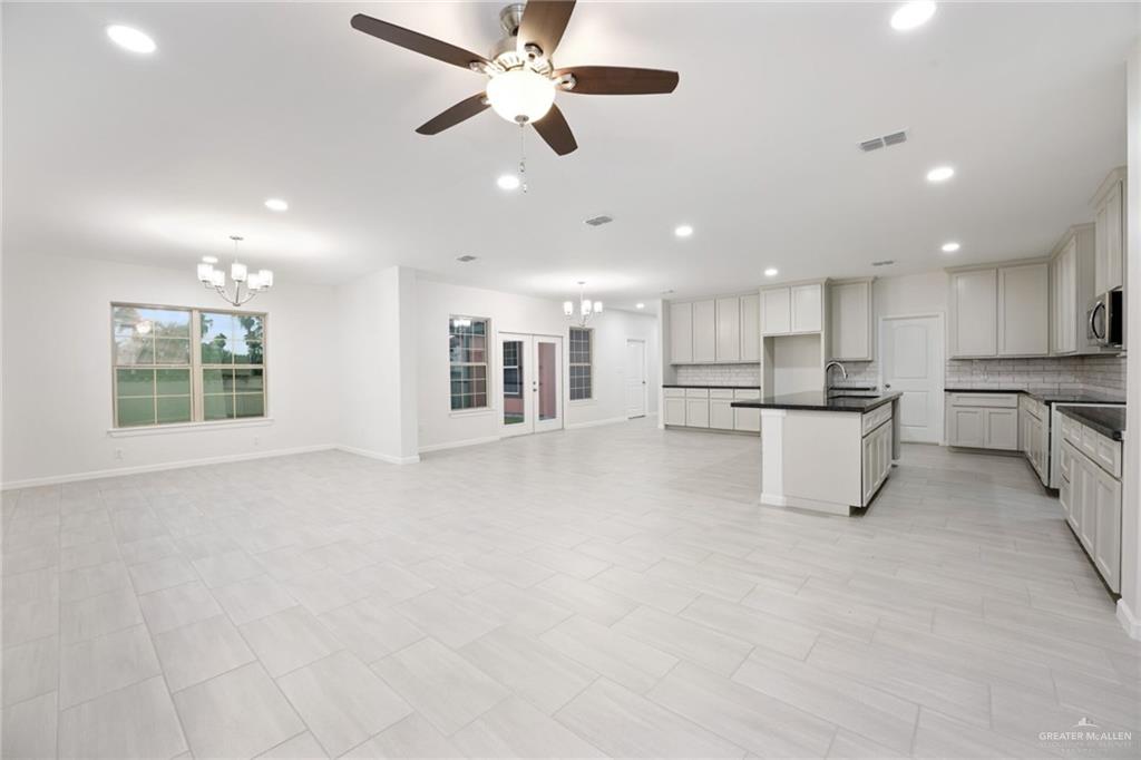 2906 Alcala Court Mission, TX 78572 - Photo 6 of 17 a view of kitchen with stainless steel appliances refrigerator oven and cabinets