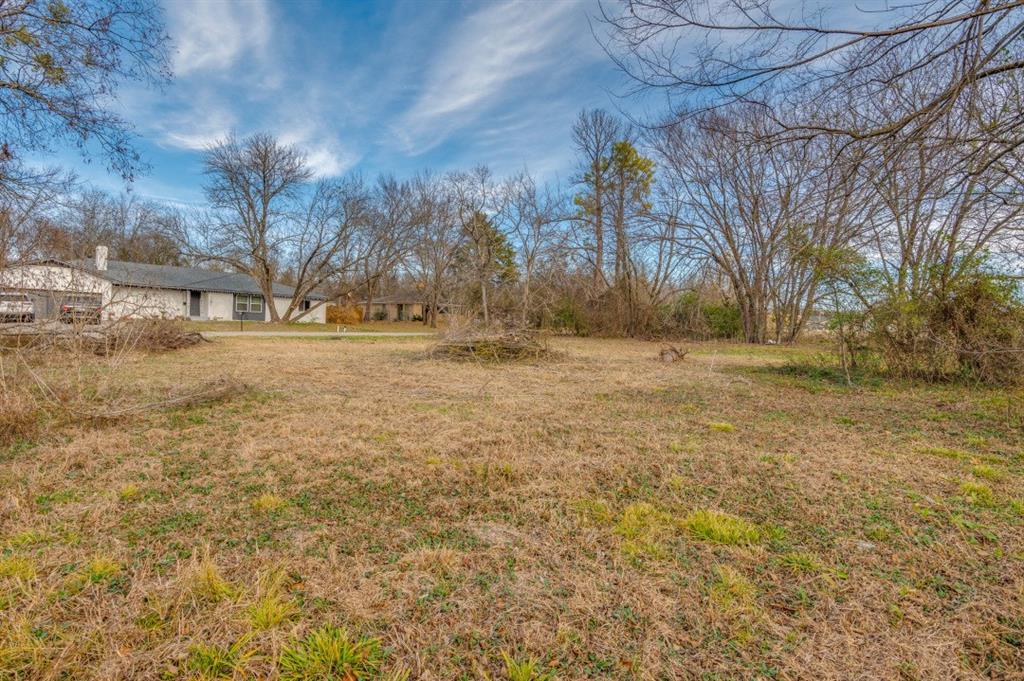 208 West 9th Street Kemp, TX 75143 - Photo 11 of 13 a view of yard with trees