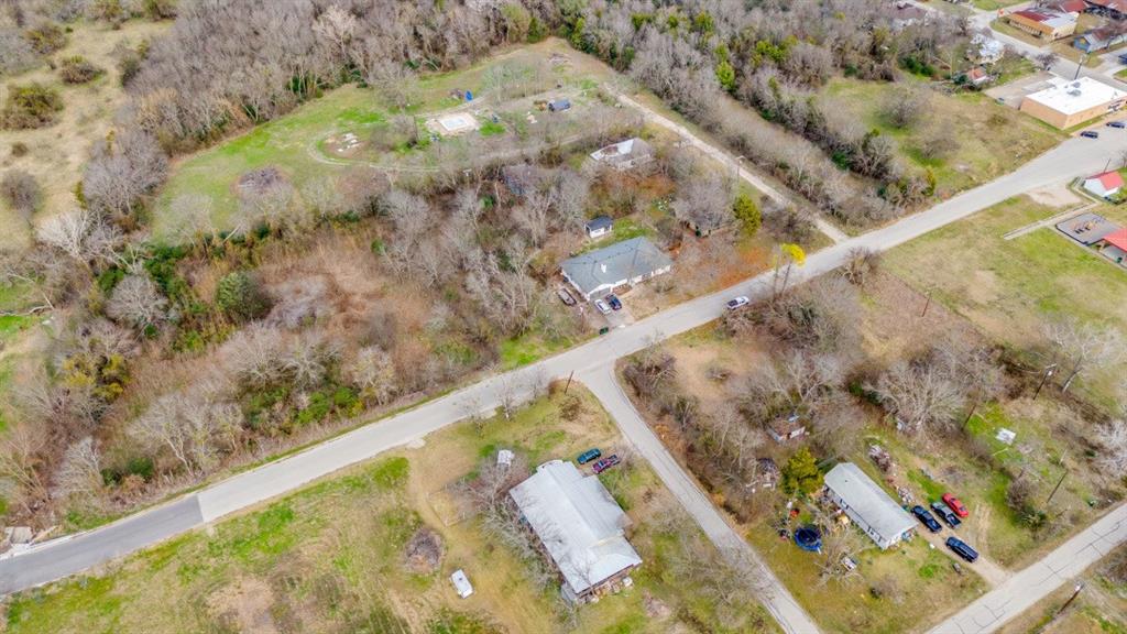 208 West 9th Street Kemp, TX 75143 - Photo 3 of 13 a view of a forest