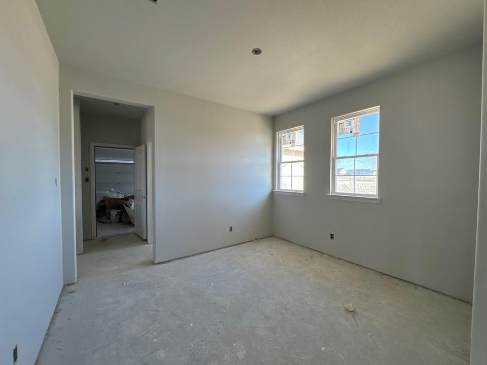 111 Brandywine Trail Rhome, TX 76078 - Photo 3 of 13 a view of an empty room with closet