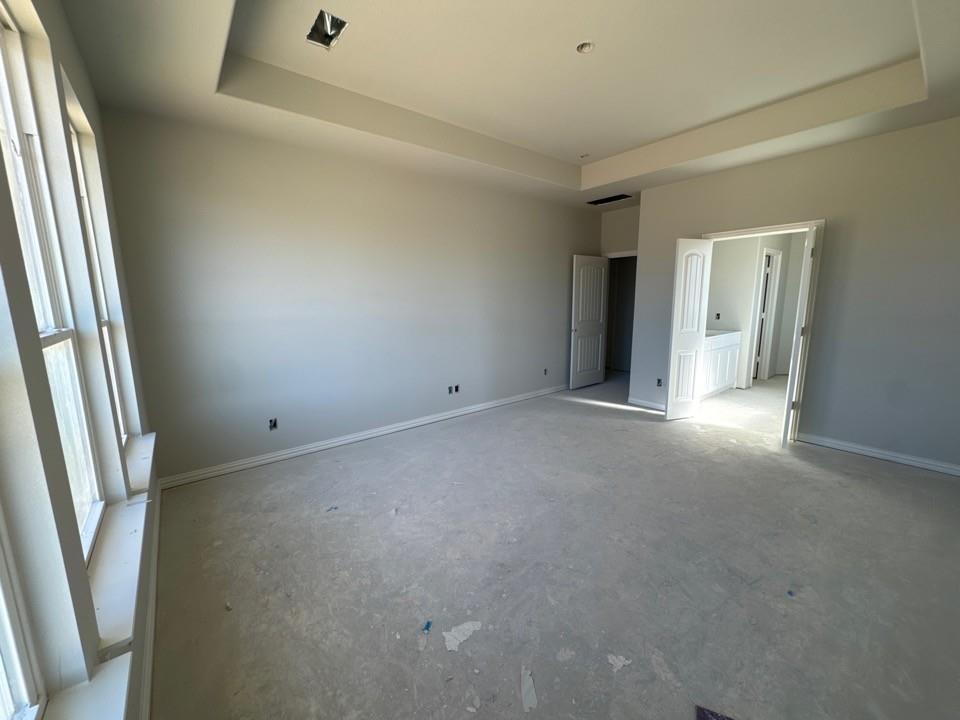 111 Brandywine Trail Rhome, TX 76078 - Photo 8 of 13 a view of an empty room and a window