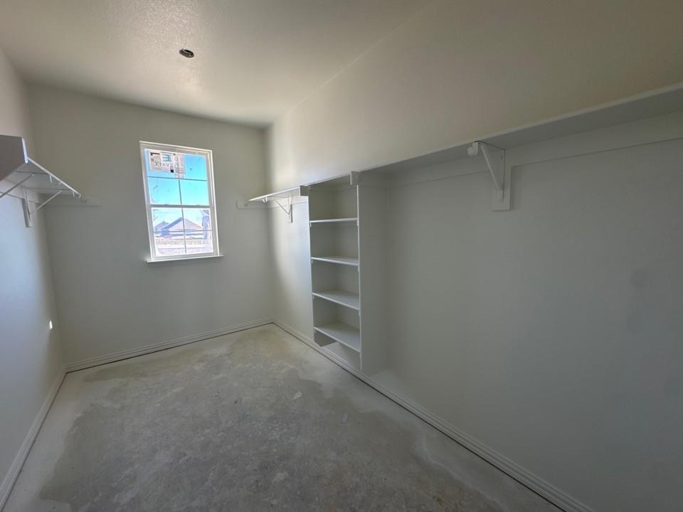 111 Brandywine Trail Rhome, TX 76078 - Photo 10 of 13 an empty room with windows