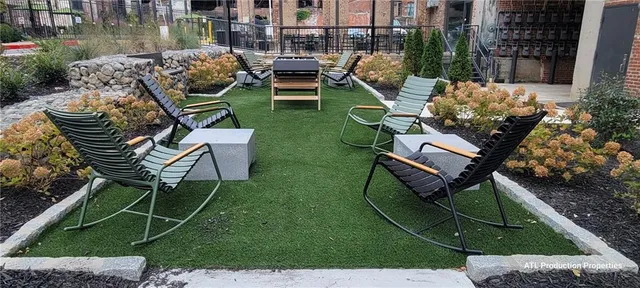 a garden view with a seating space