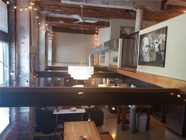 view of a room with a table and chairs