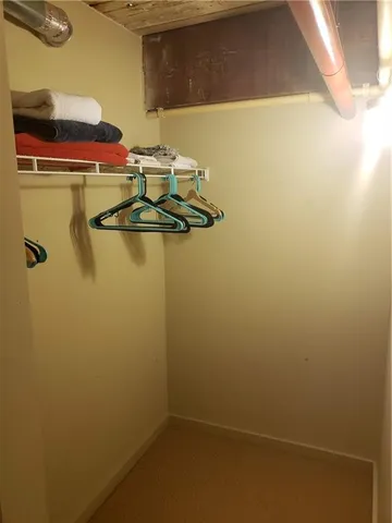 a picture of a bathroom with a shower