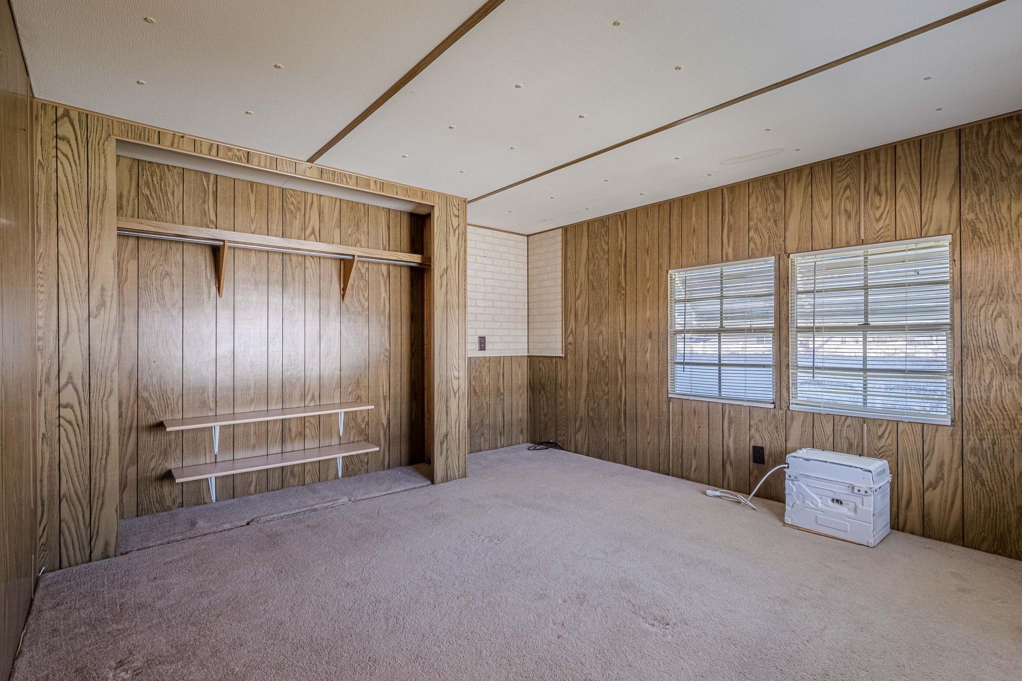 3251 E Road, Unit 22 Clifton, CO 81520 - Photo 14 of 29 an empty room with windows