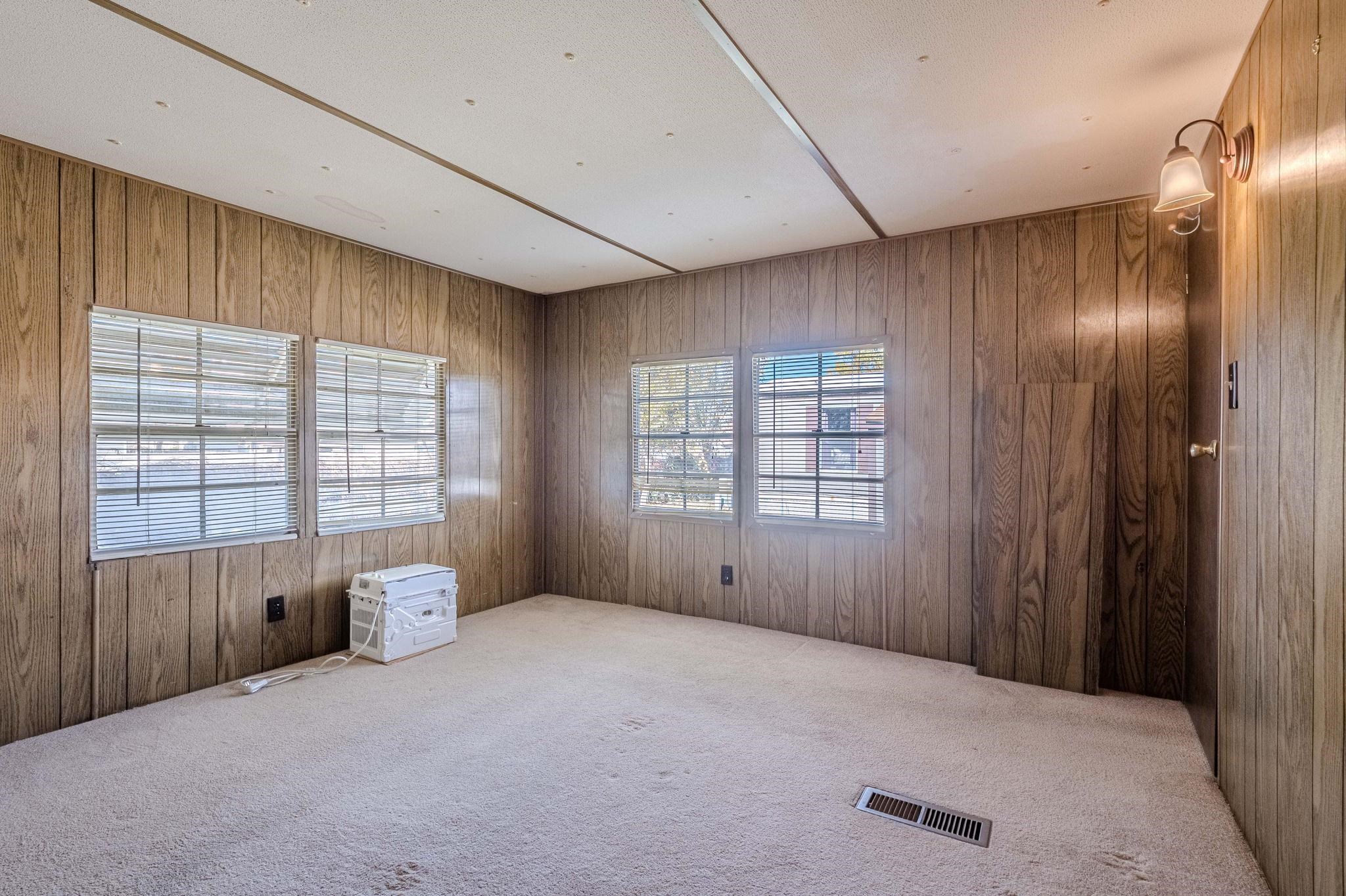 3251 E Road, Unit 22 Clifton, CO 81520 - Photo 17 of 29 a big room with windows and closet
