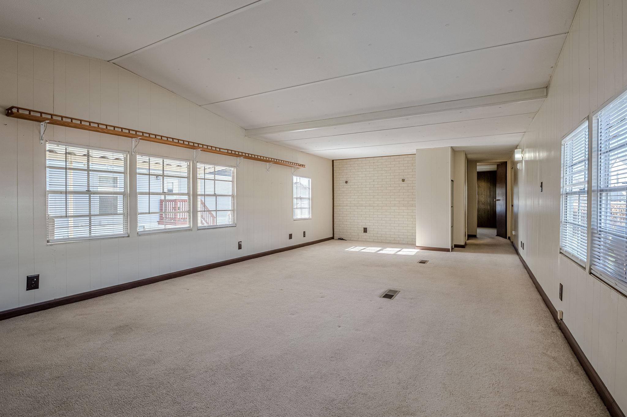 3251 E Road, Unit 22 Clifton, CO 81520 - Photo 3 of 29 a view of an empty room with a window