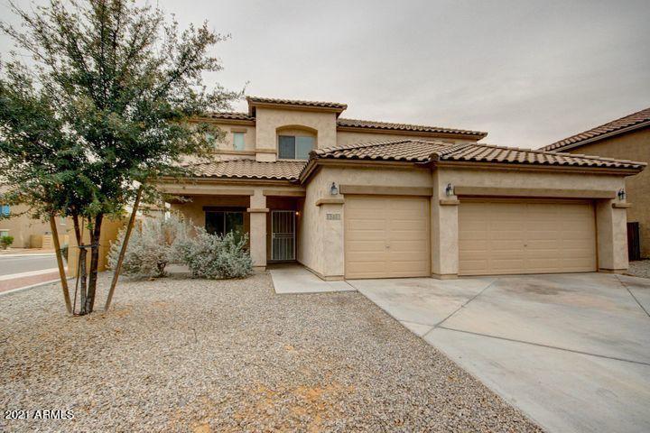 5229 West Apollo Road Laveen, AZ 85339 - Photo 2 of 2 a view of a house with large trees