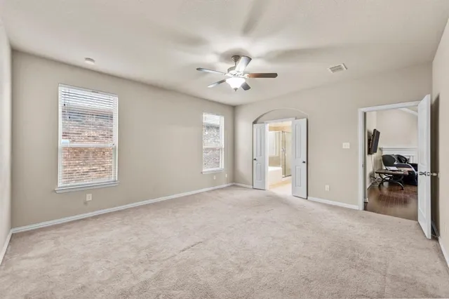 a view of a livingroom with a workspace
