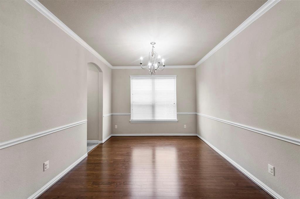 11620 Beach Street Frisco, TX 75036 - Photo 2 of 28 wooden floor in an empty room with a window