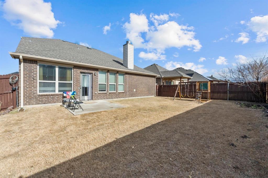 11620 Beach Street Frisco, TX 75036 - Photo 28 of 28 a view of a house with backyard and porch