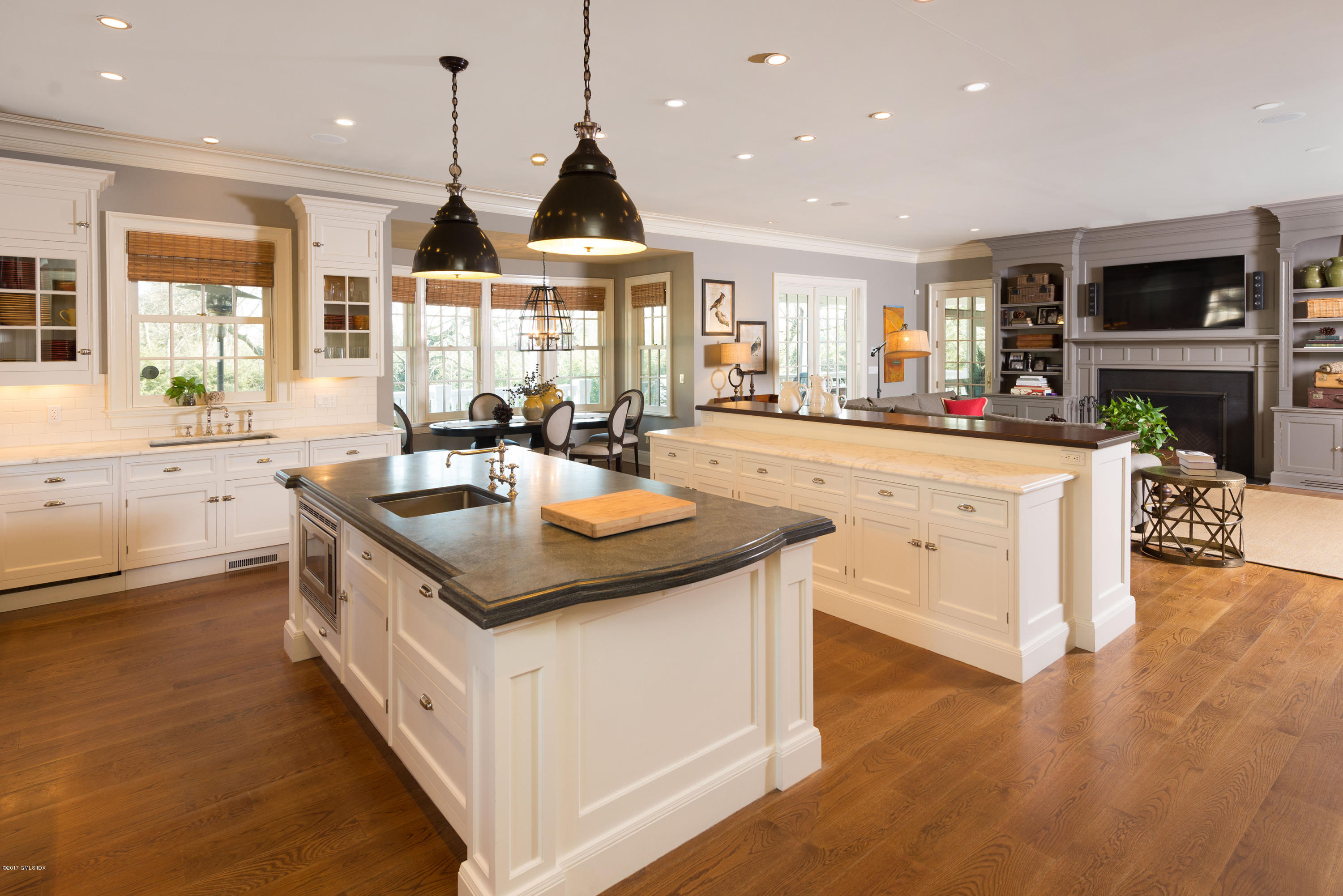 77 Maple Avenue Greenwich, CT 06830 - Photo 8 of 33 kitchen opening to family room