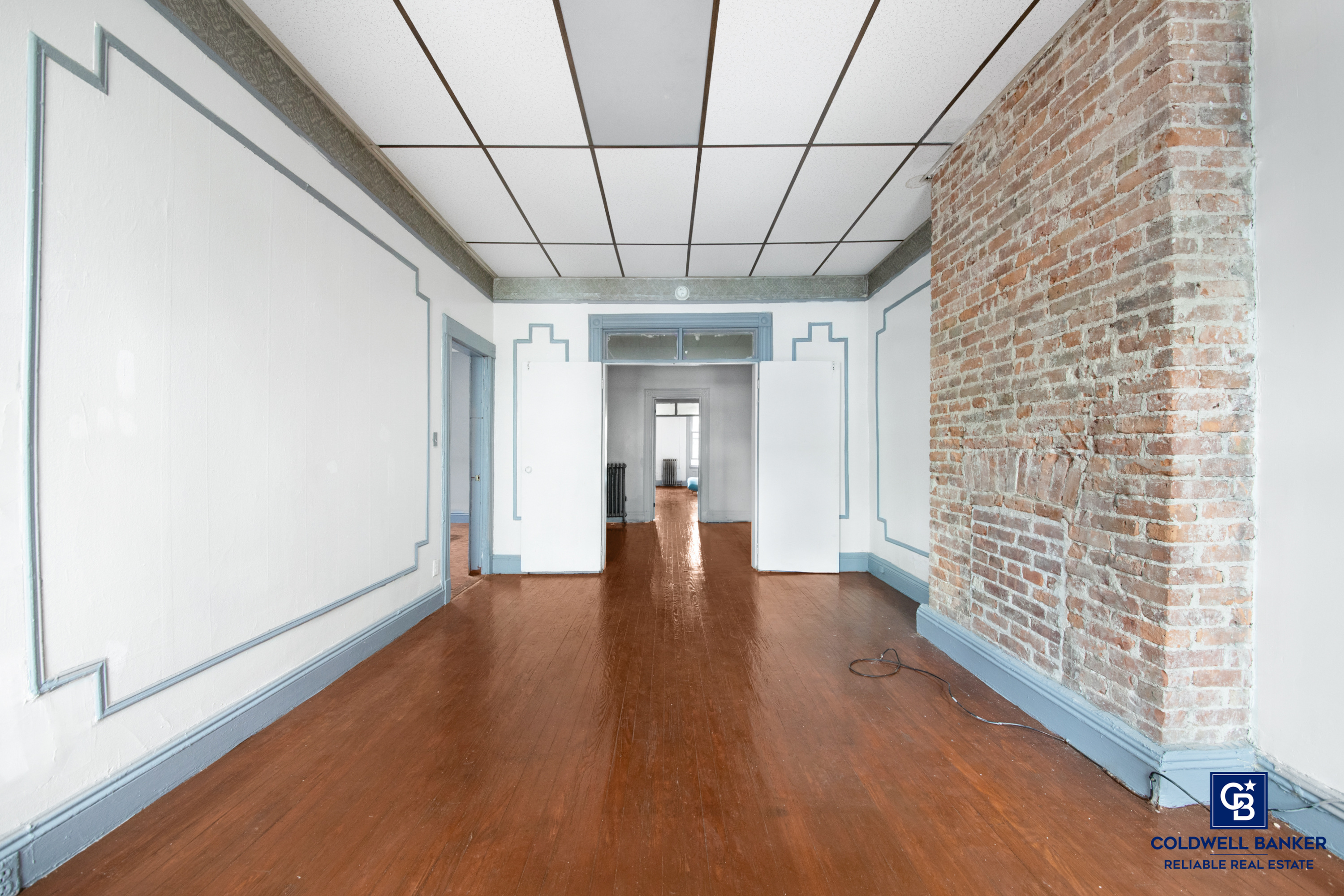 20 Weirfield Street Brooklyn, NY 11221 - Photo 8 of 12 a view of empty room with wooden floor