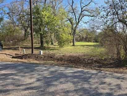 624 Pittman Road Richmond, TX 77469 - Photo 1 of 4 a backyard of a house with lots of green space