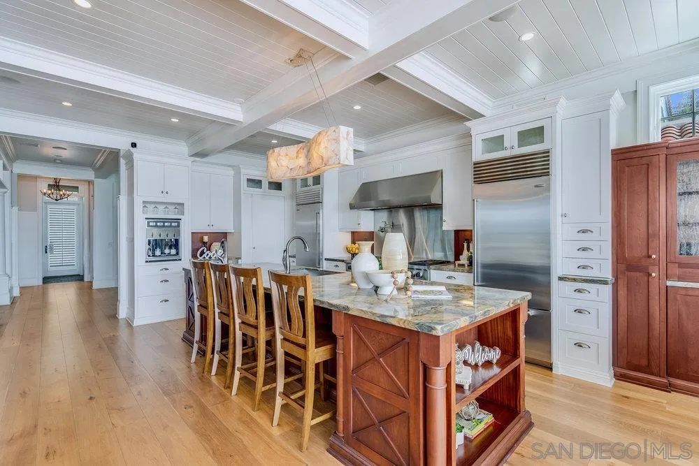 919 Ocean Boulevard Coronado, CA 92118 - Photo 14 of 63 a view of kitchen with cabinets and wooden floor