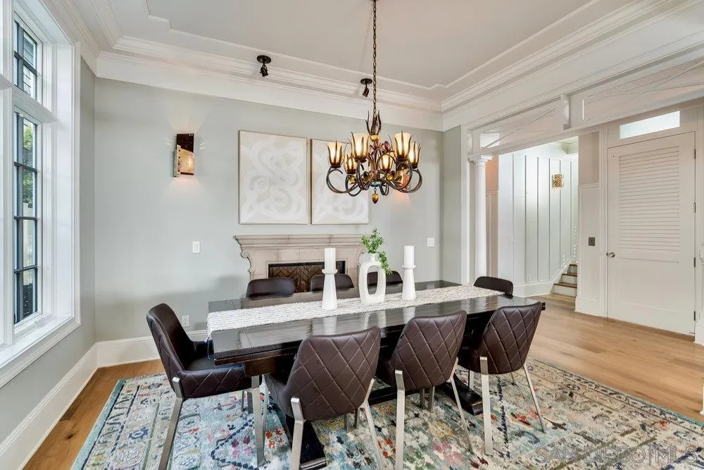 919 Ocean Boulevard Coronado, CA 92118 - Photo 17 of 63 a view of a dining room with furniture window and wooden floor