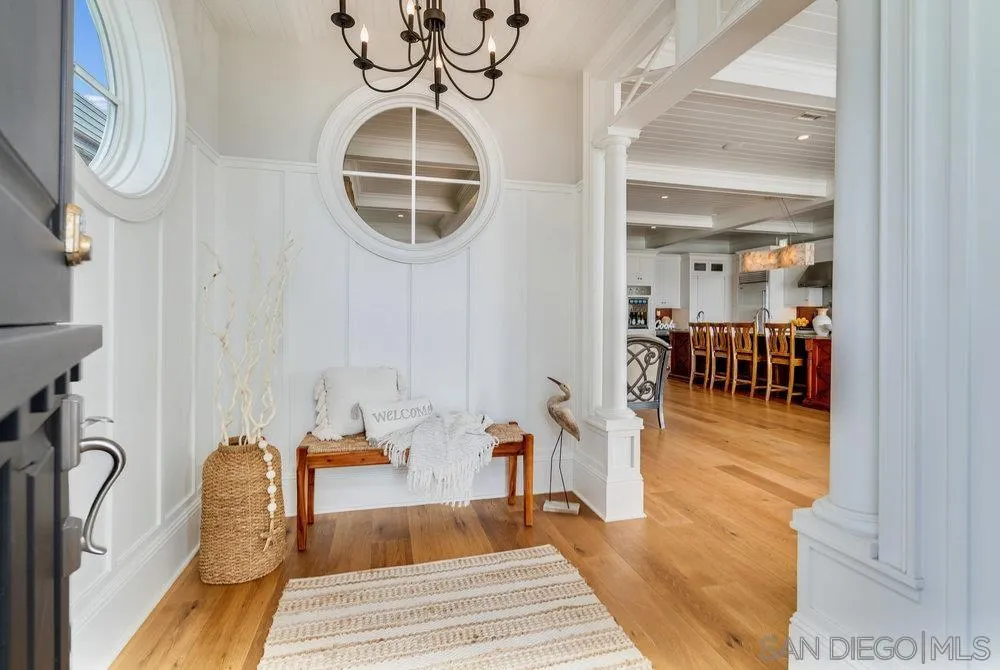 919 Ocean Boulevard Coronado, CA 92118 - Photo 19 of 63 a bedroom with furniture and a mirror