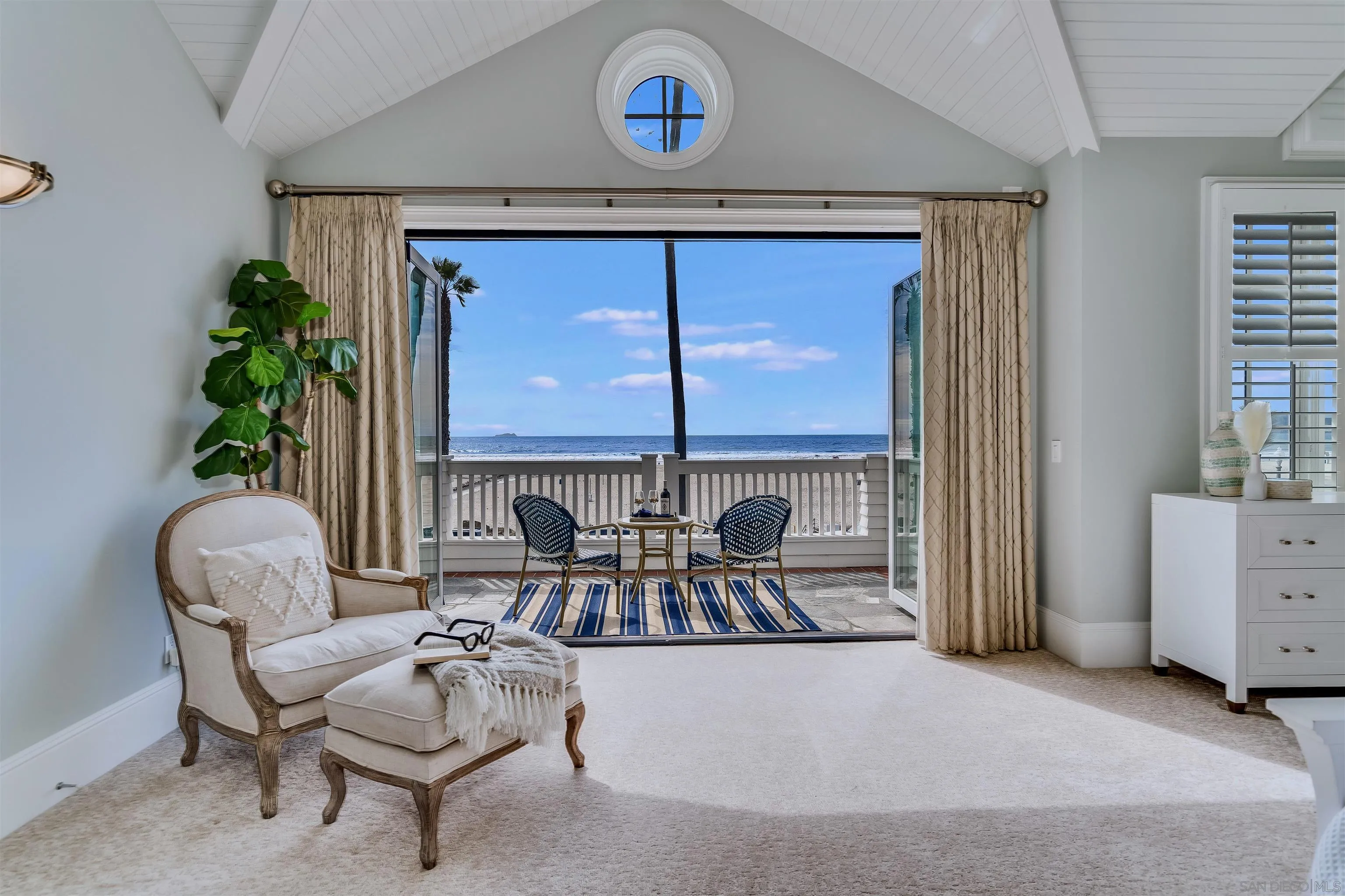 919 Ocean Boulevard Coronado, CA 92118 - Photo 21 of 63 a living room with furniture and a potted plant