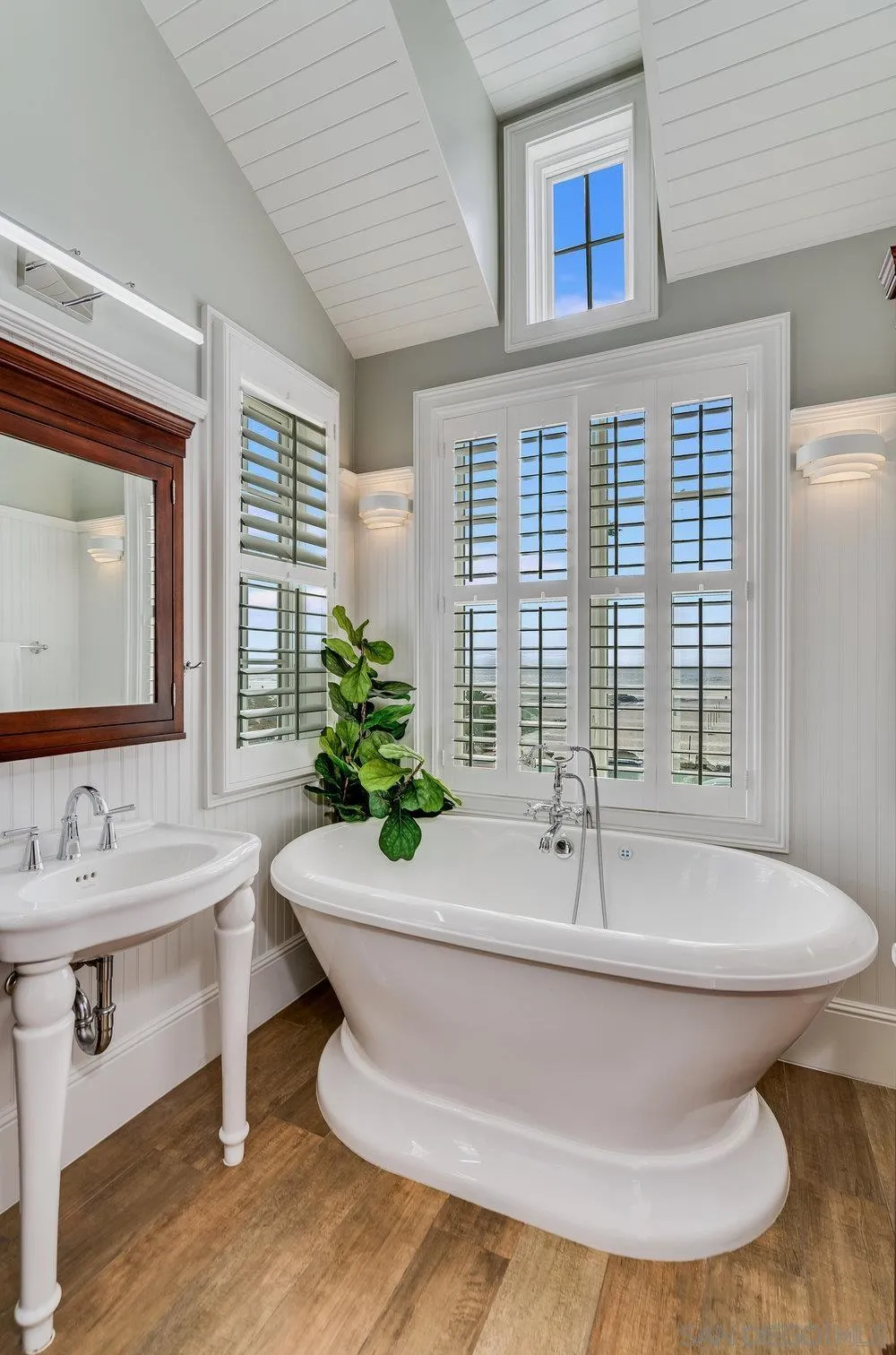 919 Ocean Boulevard Coronado, CA 92118 - Photo 30 of 63 a bathroom with a bathtub and sink