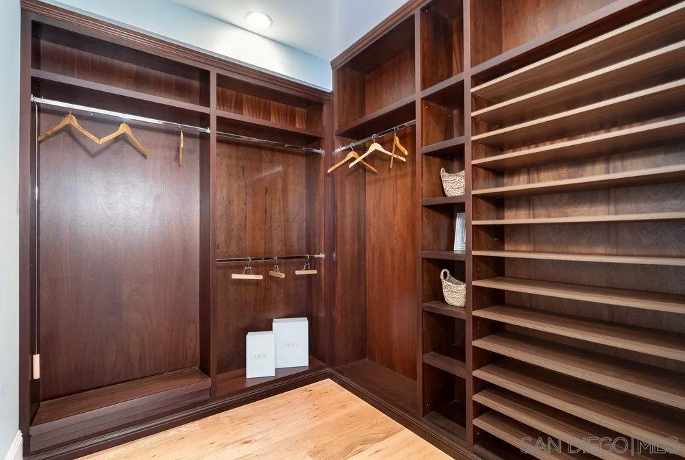 919 Ocean Boulevard Coronado, CA 92118 - Photo 31 of 63 a view of walk in closet with empty racks