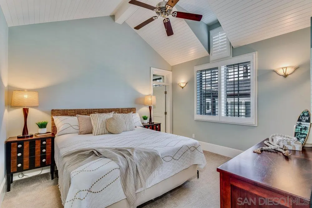 919 Ocean Boulevard Coronado, CA 92118 - Photo 34 of 63 a bedroom with a bed and window