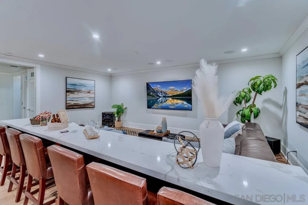 919 Ocean Boulevard Coronado, CA 92118 - Photo 46 of 63 a living room with furniture and flat screen tv